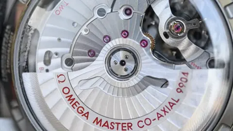 Omega watch illustrating its materials, construction and design