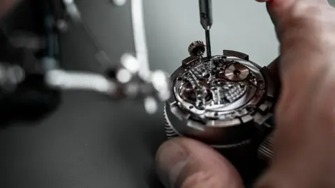 Rolex watch illustrating its materials, construction and design